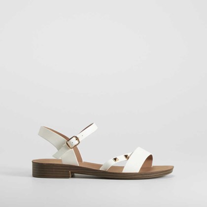 Sandalia plana tachuelas blanca NYC